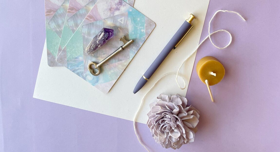 Flat lay with journal and pen — solar return personal new year reflection practice